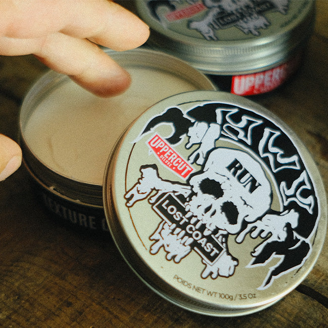 HWYxUCD tin open with hand about to take some product