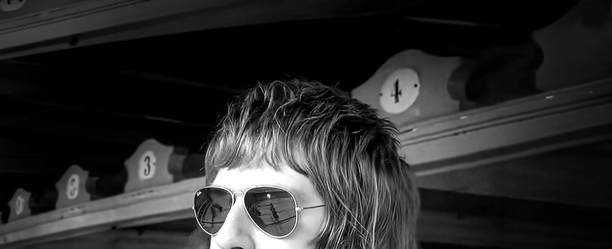 Man with Glasses and UK Rocker Hair Style